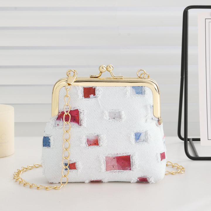 Vintage-inspirierte Stoff-Clutch