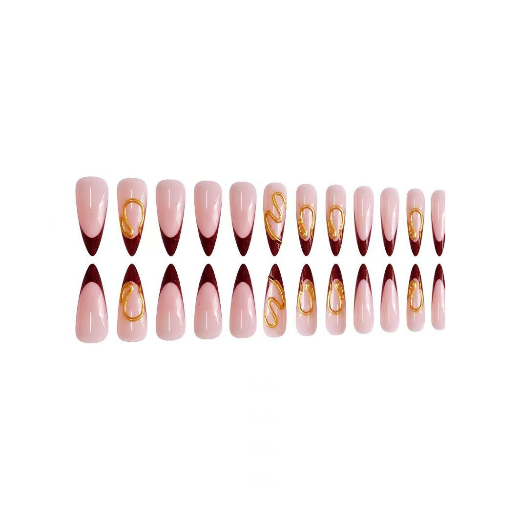 Künstlerische Stiletto-Nagelerweiterungen mit abstraktem Design Karnz