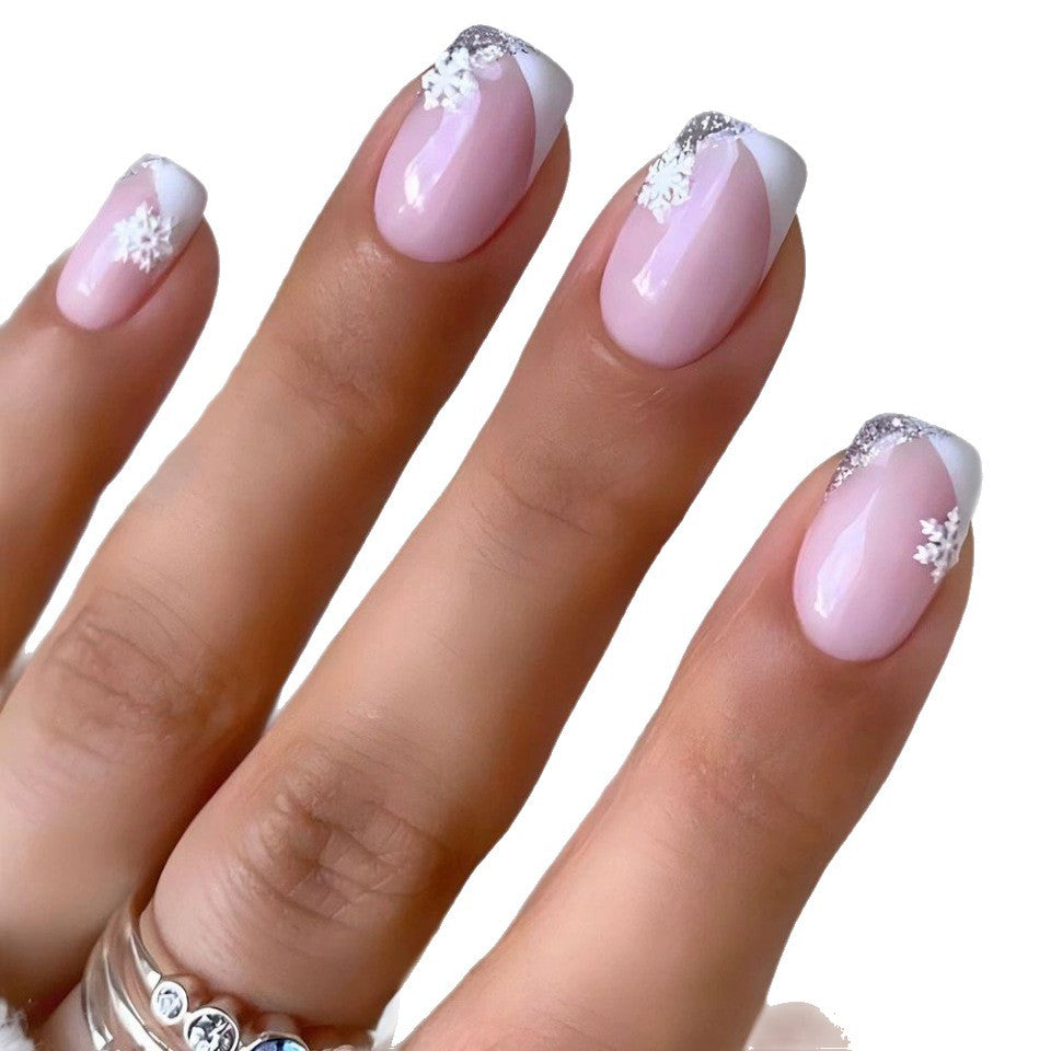 Kreative florale Schneeflocken-Nagelkunst Karnz