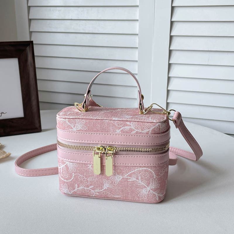 Blumenverzierte Kosmetiktasche