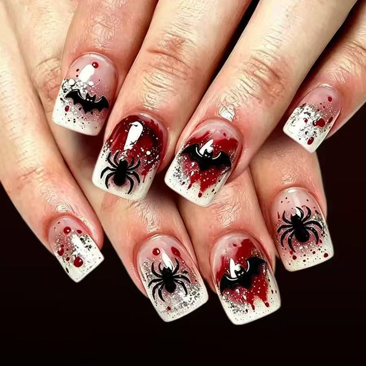 Halloween Kunstnagelset mit stilvollen Spinnennetz- und Vampirdesigns Karnz