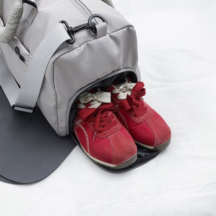 Vielseitige Reisetasche mit erweiterbarem Fach Karnz