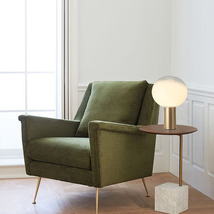 Moderne künstlerische Tischlampe mit schlankem Metallbasis und Globusschirm