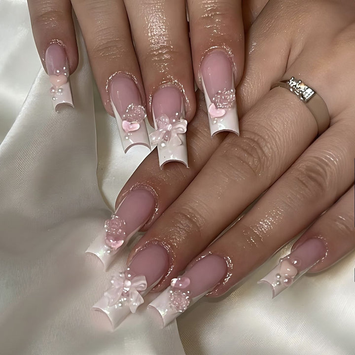 Kunstnagelset mit Glamourösen Perlen- und Glitzerelementen Karnz