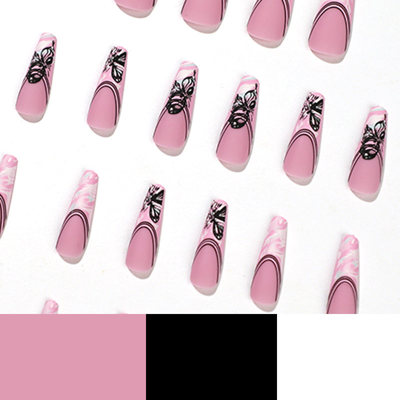 Künstliche Nagelkunst mit filigranen Schmetterlingsmotiven Karnz