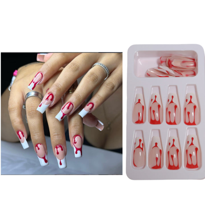 Künstlerisches Press-On Nageldesign mit Tropfeneffekt Karnz