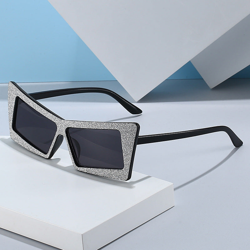 Damen geometrische Sonnenbrille mit glitzernden Elementen Karnz