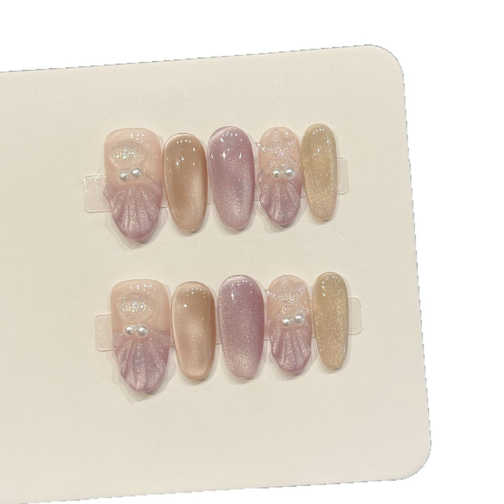 Elegantes dekoratives Press-On-Nagelkunstset mit Perlen- und Glitzerakzenten