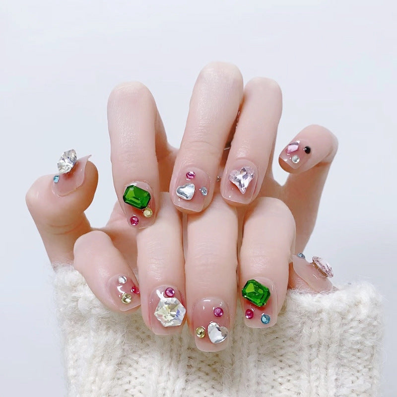 Kunstnagelset mit funkelnden Glitzer- und holografischen Akzenten Karnz