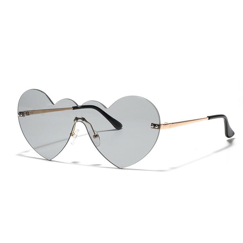 Damen extravagante Herz-Sonnenbrille mit schützenden Gläsern Karnz