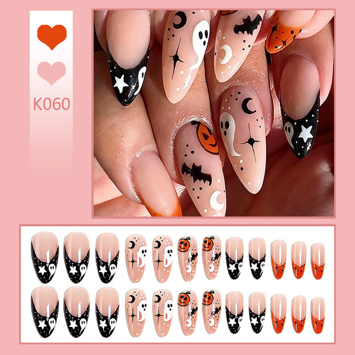 Kunstnägel im Halloween-Design mit Geistern und Kürbis-Motiven Karnz