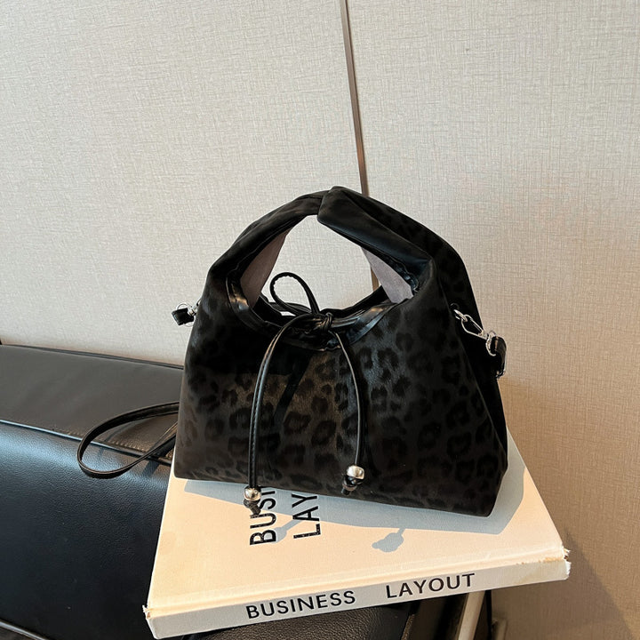 Stylische und funktionale Drawstring-Handtasche Karnz