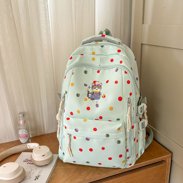 Verspielt gemusterter Schulrucksack