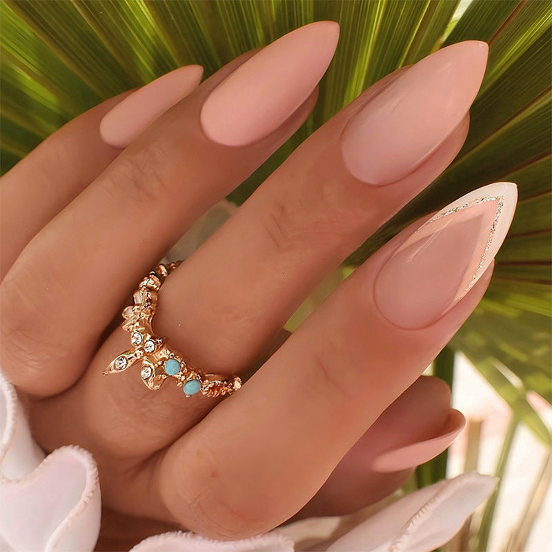 Elegantes Stiletto Press-On Nagelset mit strahlenden Edelstein-Akzenten Karnz