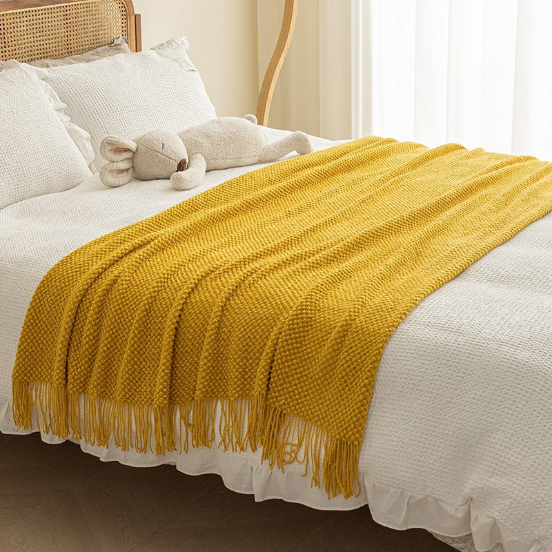 Strukturierte Strickwurfdecke