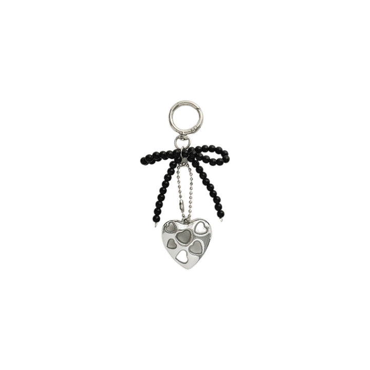 Herzförmiger Charm-Schlüsselanhänger mit Perlen-Schleife Karnz