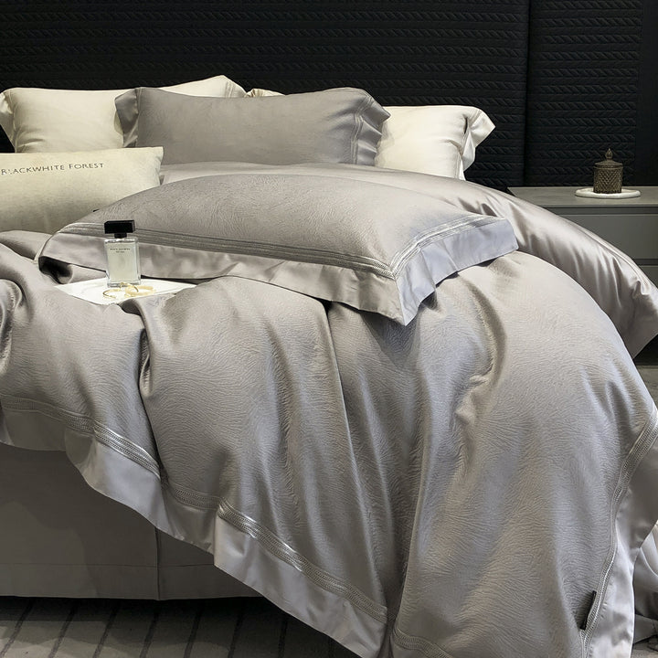 Premium-Baumwollsatin-Bettwäschegarnitur mit strukturierter Matelassé-Bordüre und Hotelverschluss