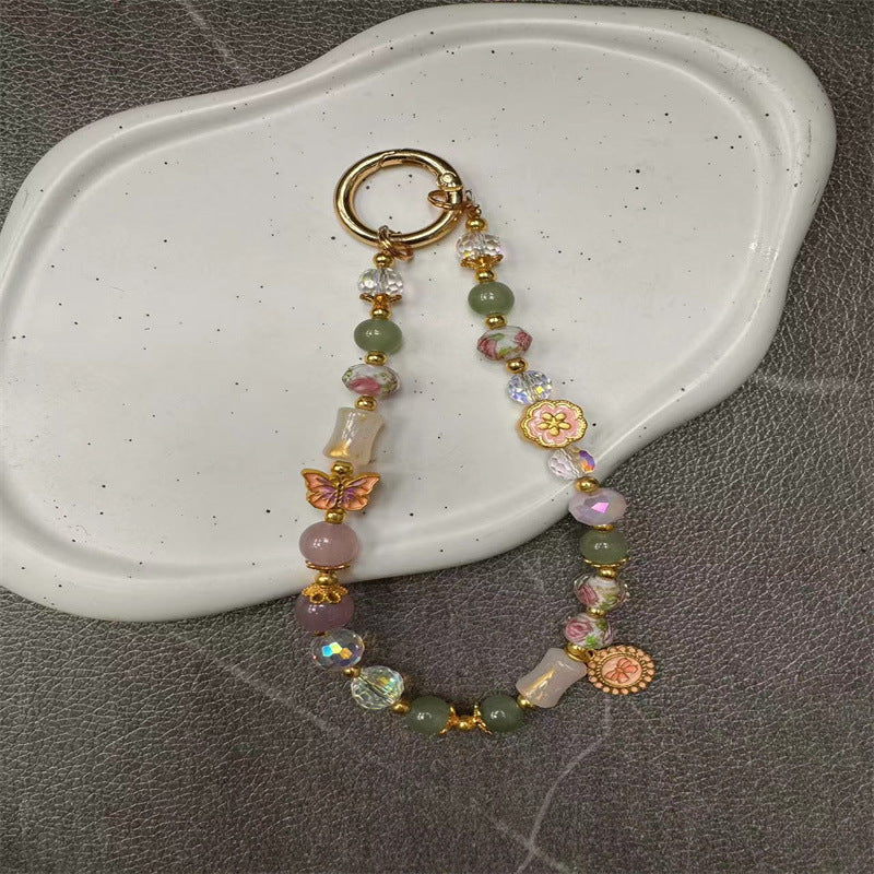 Dekorativer Perlen Charme Schlüsselanhänger Karnz 1790135355
