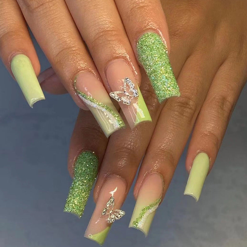 Glitzernde Kunstnägel mit Schmetterlingsdesign Karnz
