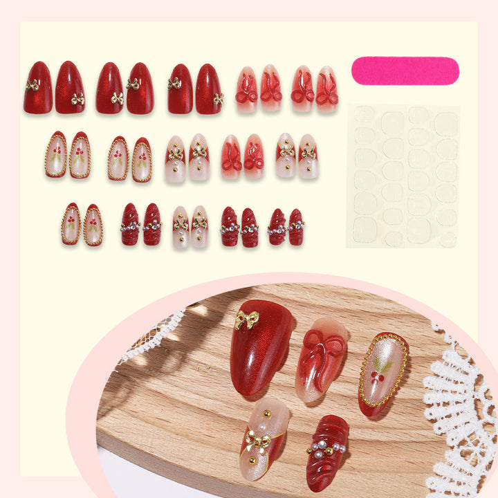 Kunstnagelset mit glamourösen Schleifen und funkelnden Details Karnz