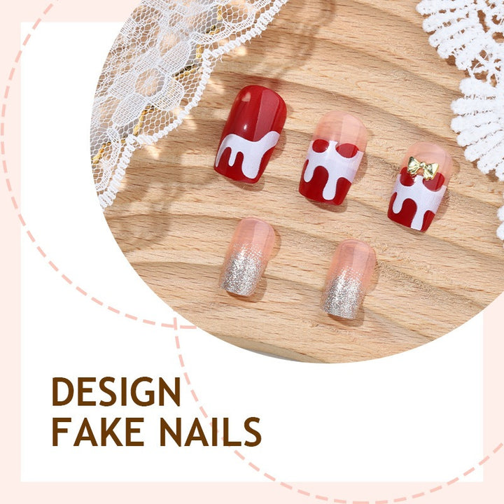 Kunstnagelset mit festlichen Weihnachtsmotiven Karnz