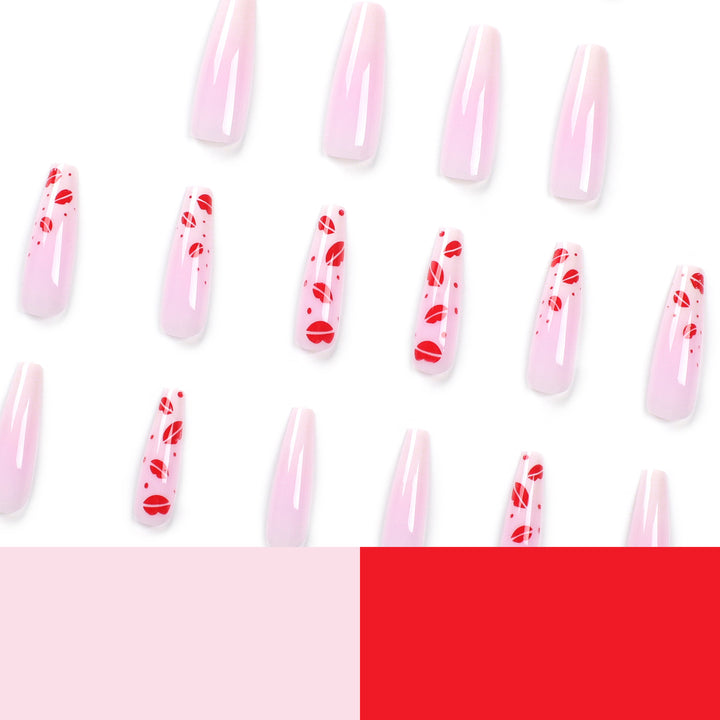 Kunstvolle Stiletto-Nägel mit Lippenmotiven Karnz