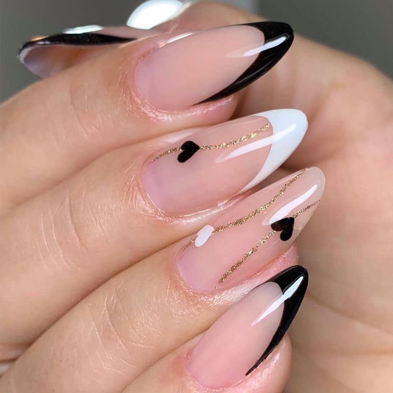 Elegante Stiletto Press-On Nagelkunst mit Strass-Akzenten Karnz