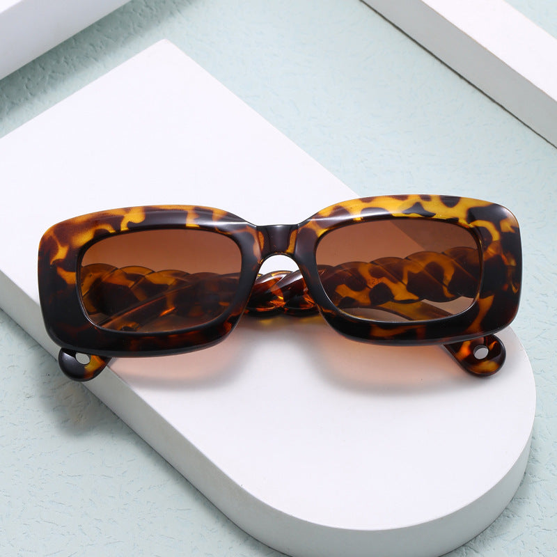 Damen modische quadratische Sonnenbrille mit einzigartigem gedrehten Bügeldesign Karnz