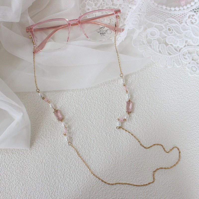 Elegante Schmuckkette mit Perlen und Pinken Akzenten Karnz
