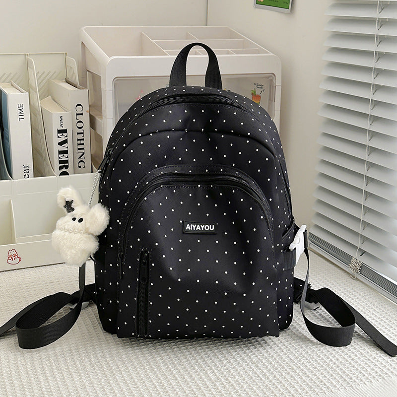 Charmanter gepunkteter Rucksack