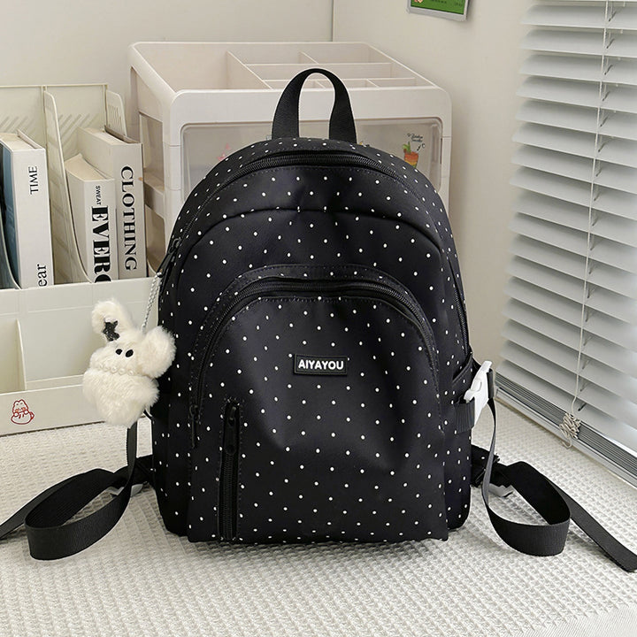 Charmanter gepunkteter Rucksack