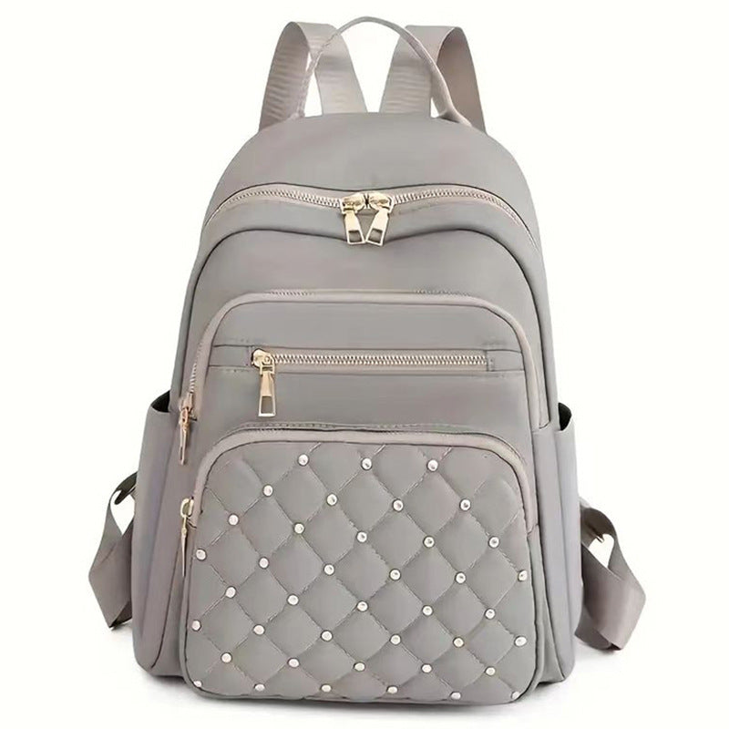 Damen gesteppter Rucksack mit dekorativen Nieten Karnz