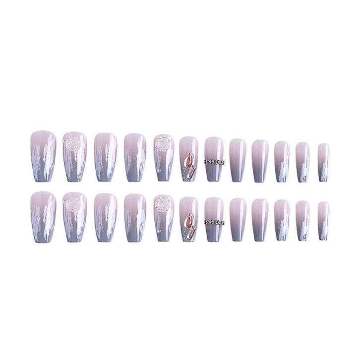 Kunstnagelset mit filigranen Rosen- und Glitzerverzierungen Karnz