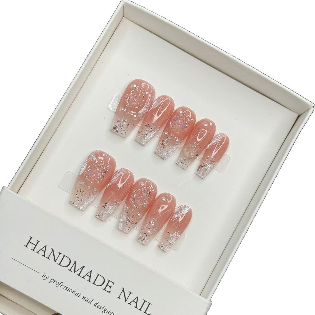 Elegante handgemachte Press-On-Nägel mit Blumendesign