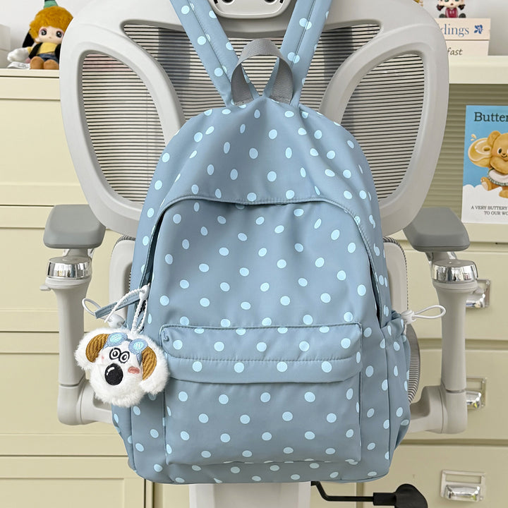 Verspielt gepunkteter Rucksack