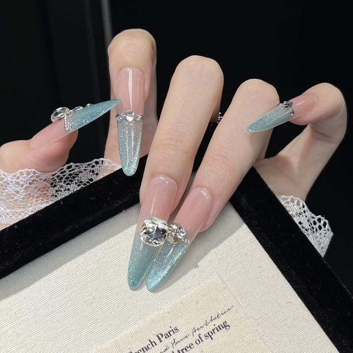 Glamouröse kristallverzierte Stiletto Press-On-Nagelerweiterungen Karnz