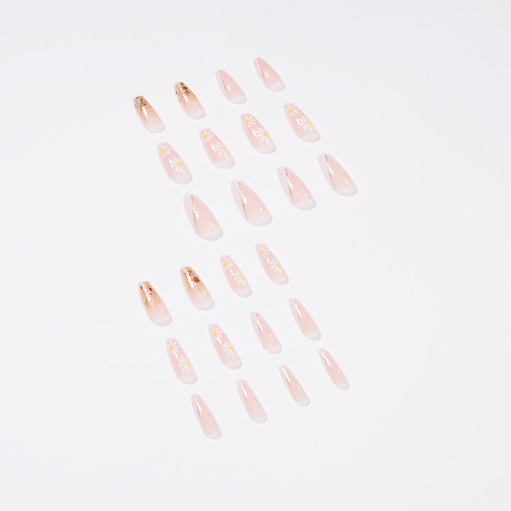 Kunstvolle Nagelverlängerungen mit floralen Designs und Glitzerakzenten Karnz