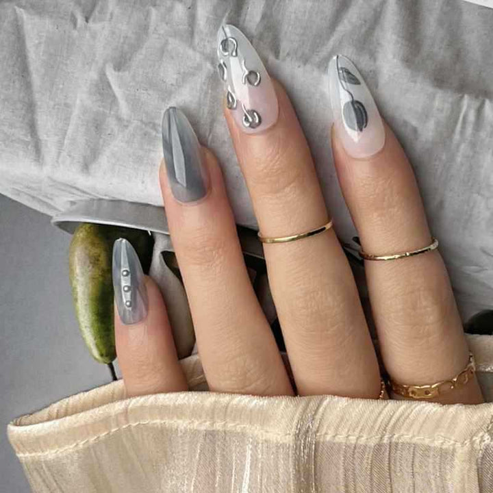 Künstlerisches Stiletto Presse-auf-Nageldesign mit zeitgenössischen Akzenten Karnz