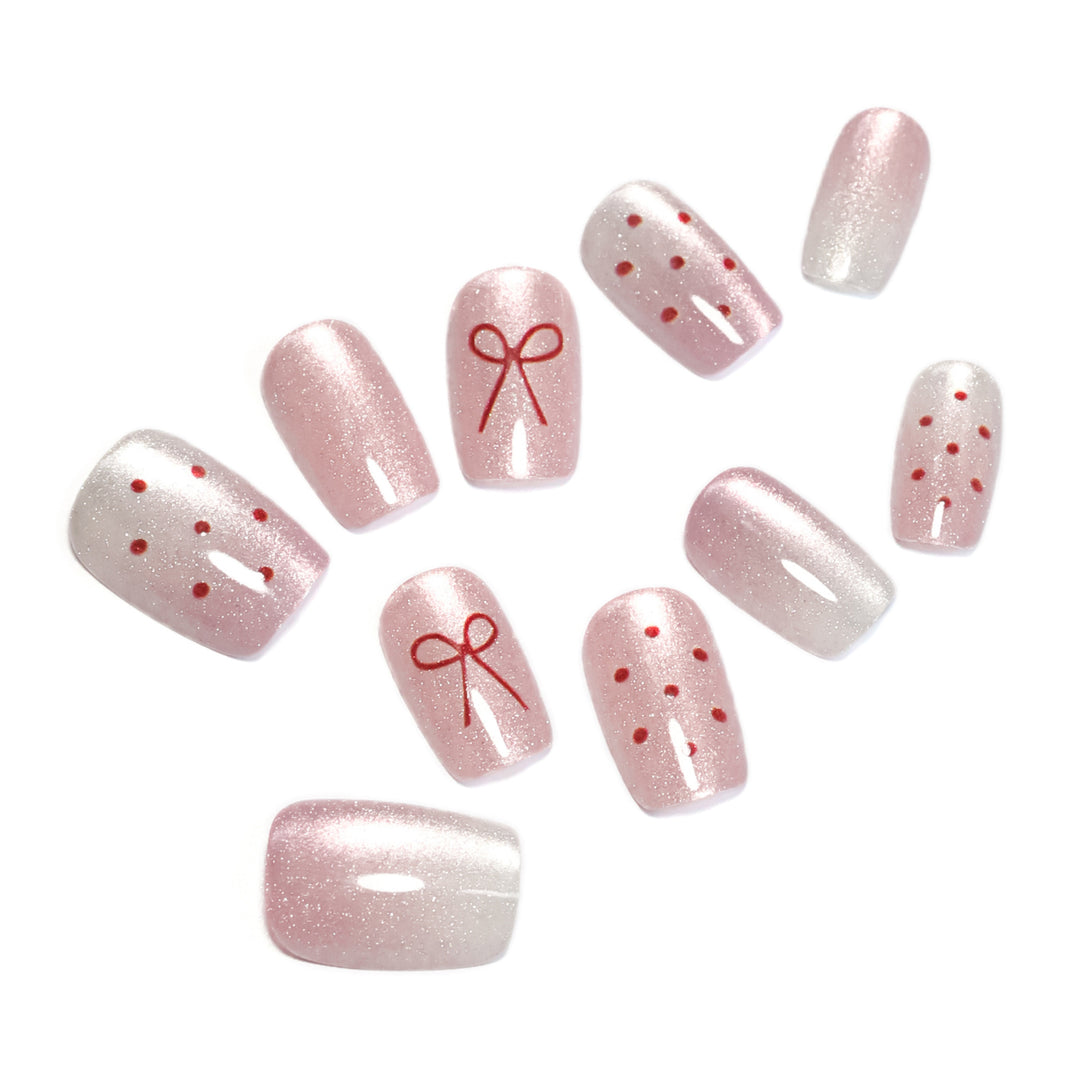Künstliche Nagelkunst mit niedlichen Schleifen-Design Karnz