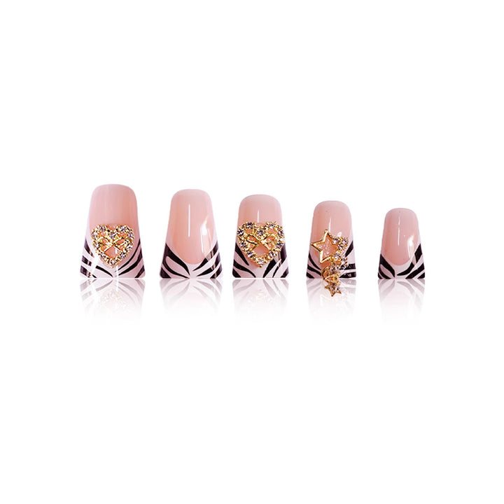 Künstlerische zebra-musterierte Nagelverzierungen mit Edelstein-Akzenten Karnz