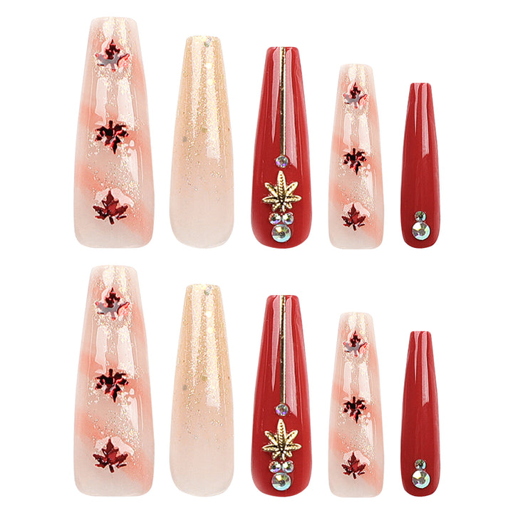 Kunstvolle Nagelverlängerungen mit Herbstmotiven Karnz