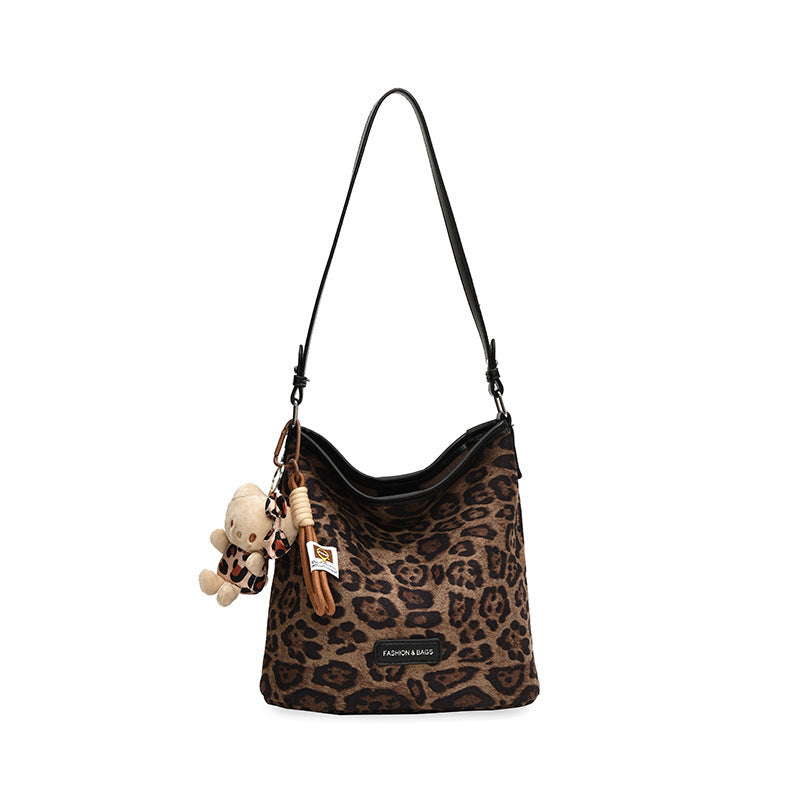 Stylische reversible Schultertasche