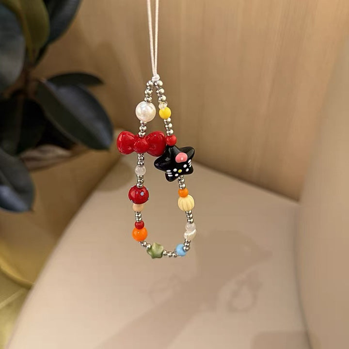 Verspielt Perlen Charme Brillenhalter Karnz