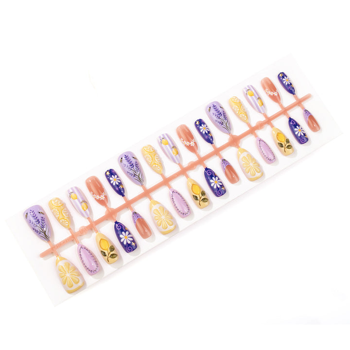 Manuelles Nagelkunst-Set mit floralen und Zitronendesigns