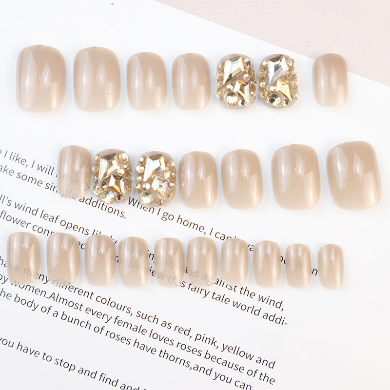 Dekoratives Press-On Nagelkunst Set mit Edelsteinakzenten