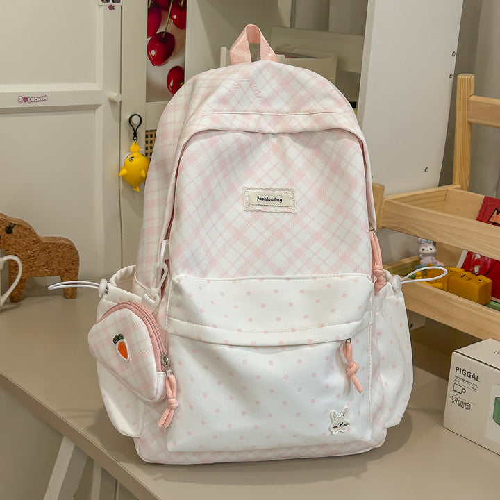 Stylische Karomuster-Rucksack mit lustigen dekorativen Akzenten Karnz