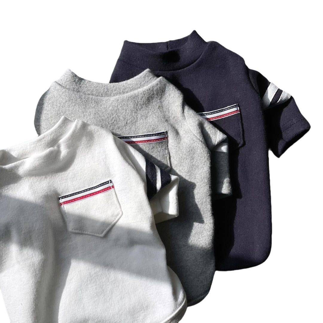 Baumwolle Polo Tee mit Brusttasche & gestreiften Ärmeln