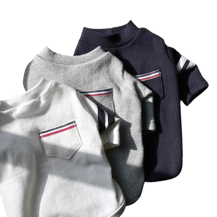 Baumwolle Polo Tee mit Brusttasche & gestreiften Ärmeln