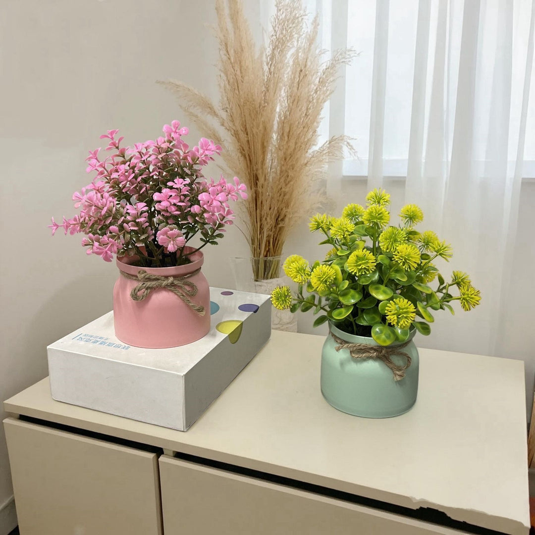 Künstlerisches Kunstblumenarrangement