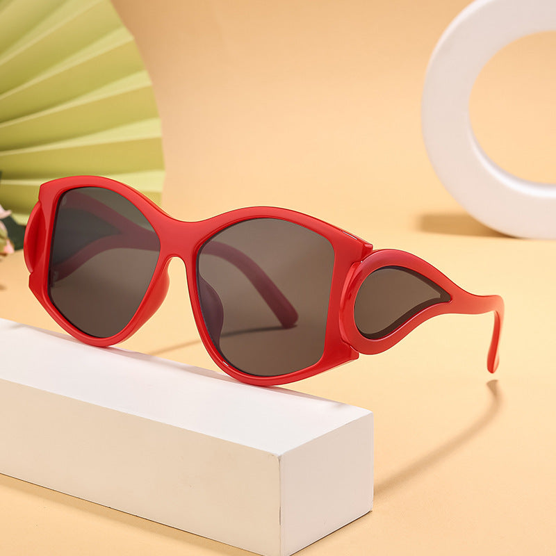 Damen moderne Cat-Eye Sonnenbrille mit einzigartigem Rahmen und UV-Schutz Karnz